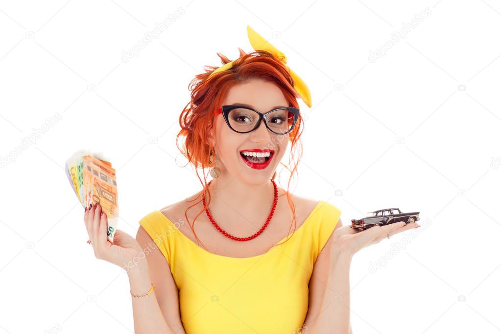 Closeup portrait, young business woman, bank agent, representative holding model black car, euro money cash bills in hands isolated white background.Lease offers, credit line, financing, dealership