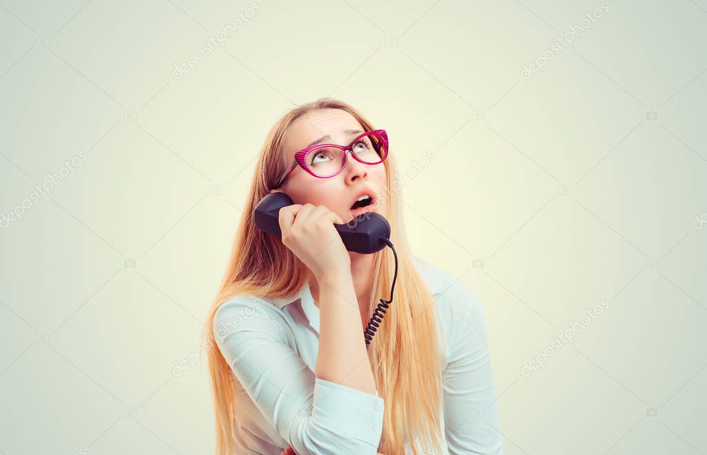 Bored woman speaking on phone