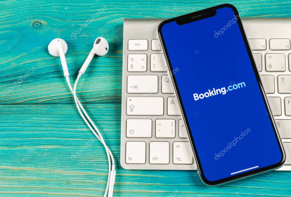 Sankt-Petersburg, Russia, June 2, 2018: Booking.com application icon on Apple iPhone X screen close-up. Booking app icon. Booking.com.  Social media app. Social network