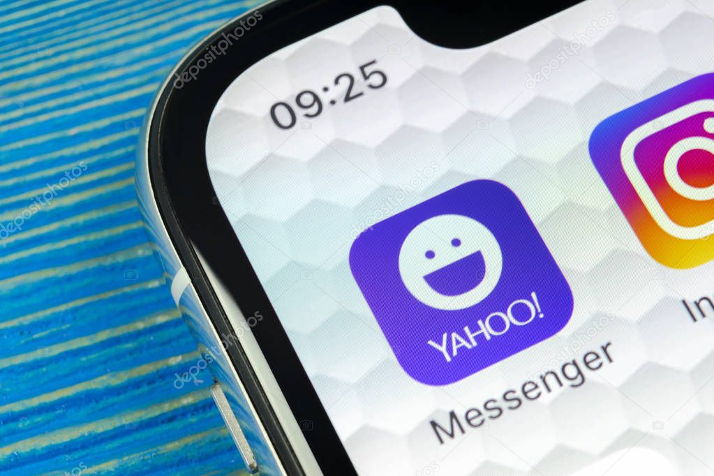 Sankt-Petersburg, Russia, June 20, 2018: Yahoo messenger application icon on Apple iPhone X smartphone screen close-up. Yahoo messenger app icon. Social media icon. Social network