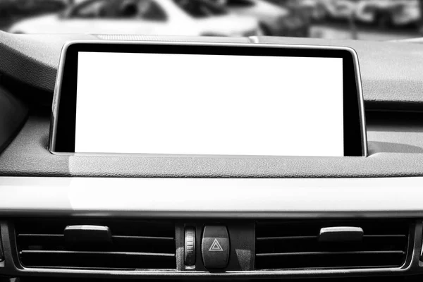 Monitor in car with isolated blank screen use for navigation maps and GPS. Isolated on white with clipping path. Car detailing. Modern car interior details. Black and white