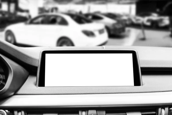 Monitor in car with isolated blank screen use for navigation maps and GPS. Isolated on white with clipping path. Car detailing. Modern car interior details. Black and white