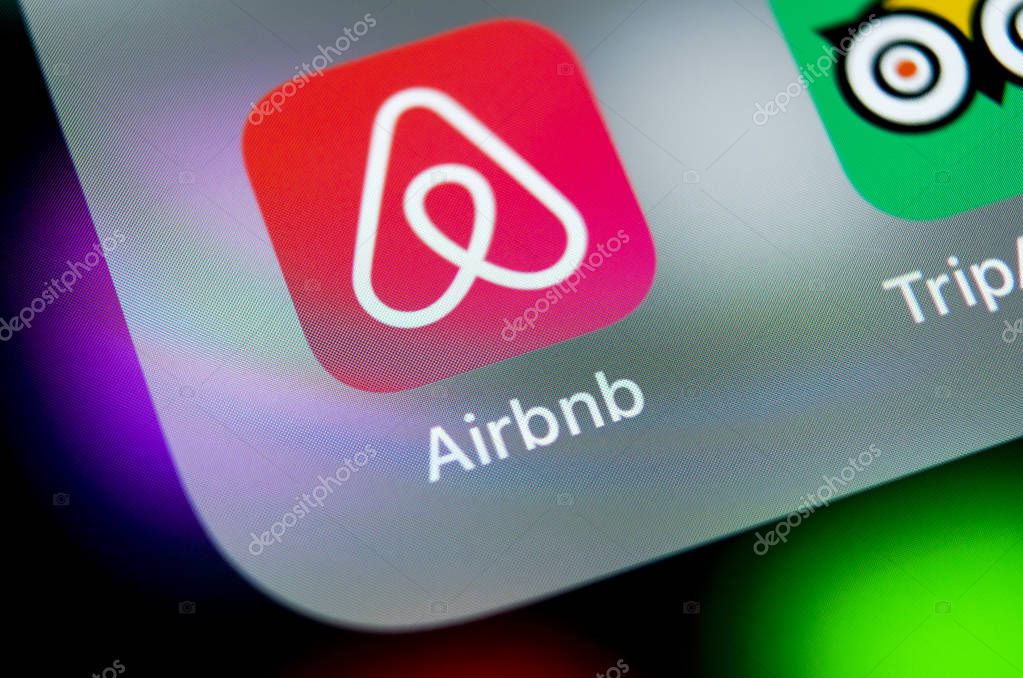 Sankt-Petersburg, Russia, August 16, 2018: Airbnb application icon on Apple iPhone X screen close-up. Airbnb app icon. Airbnb.com is online website for booking rooms. social media network.
