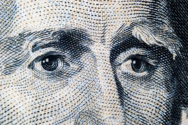 Yakın kadar olan Andrew Jackson portre görüntülemek 20 dolarlık banknot. Parayı arka plan. 20 dolarlık banknot Andrew Jackson ile makro atış gözleri. Para arka plan. Yüz portre