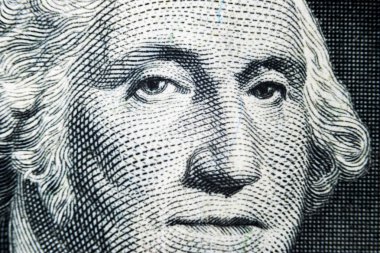 Bizi Başkan George Washington yüz portre ABD bir dolar notu. Makro vurdu. Parayı arka plan. George Washington makro atış gözleri. 
