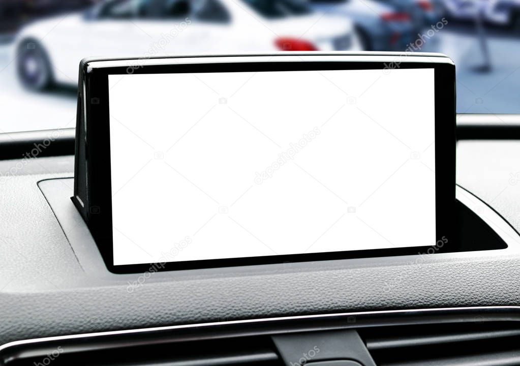 Monitor in car with isolated blank screen use for navigation maps and GPS. Isolated on white with clipping path. Car detailing. Modern car interior details. 