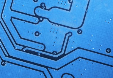 Bir devre panosunun makro görüntüsü, rezistanslı mikroçipler ve elektronik bileşenler. Bilgisayar donanım teknolojisi. Entegre iletişim işlemcisi. Bilgi mühendisliği. Yarı iletken. PCB. Yakın çekim.