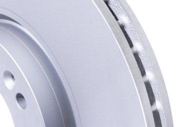 Beyaz arka plan üzerinde izole disk fren. Otomobil parçaları. Fren disk rotor üzerinde beyaz izole. Disk fren. Araba parçası. Araba ayrıntılı. Yedek parçalar