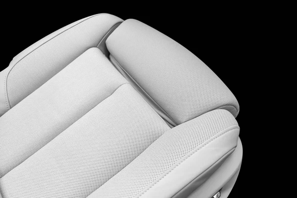 White leather interior of the luxury modern car. Perforated whit