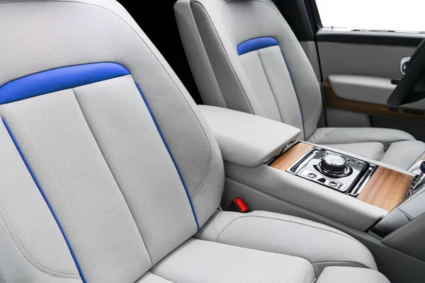 Modern luxury car white leather interior with natural wood panel