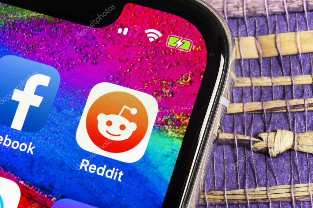 Helsinki, Finland, February 17, 2019: Reddit application icon on Apple iPhone X smartphone screen close-up. Reddit app icon. Reddit is an online social media
