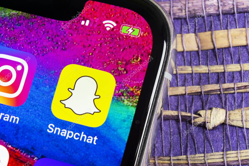 Helsinki, Finland, February 17, 2019: Snapchat application icon on Apple iPhone X smartphone screen close-up. Snapchat app icon. Social media icon. Social network