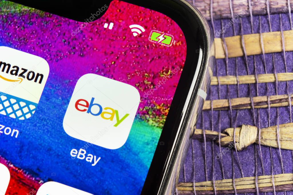 Helsinki, Finland, February 17, 2019: eBay application icon on Apple iPhone X screen close-up. eBay app icon. eBay.com is largest online auction and shopping websites.