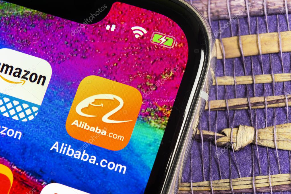 Helsinki, Finland, February 17, 2019: Alibaba application icon on Apple iPhone X smartphone screen close-up. Alibaba app icon. Alibaba.com is popular e-commerce application. Social media icon