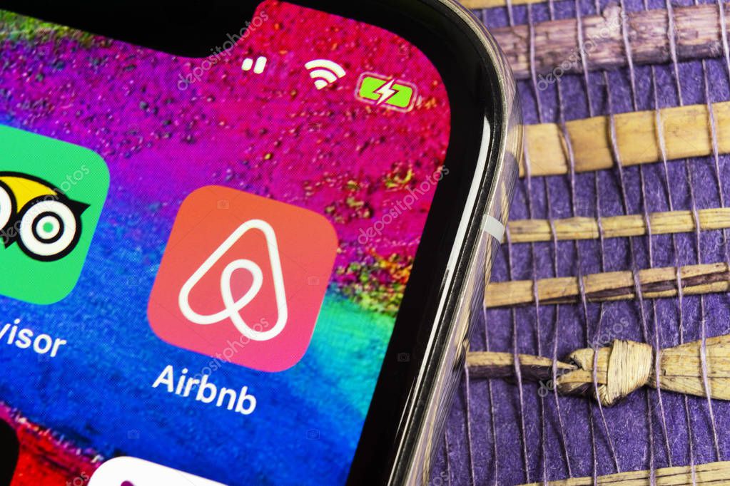 Helsinki, Finland, February 17, 2019: Airbnb application icon on Apple iPhone X screen close-up. Airbnb app icon. Airbnb.com is online website for booking rooms. social media network.