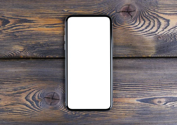 Smartphone ile boş perde kadar sahte. Smartphone screensmartphone boş ekran yukarı alay ile izole. Smartphone izole ekran kırpma yoluyla. Cep telefonu beyaz ekran ile kopya alanı ofis masasında. Metin için boş yer. İzole beyaz ekran