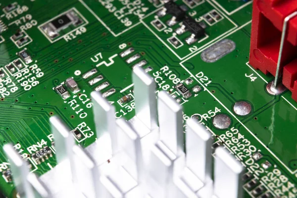 Macro shot of Circuit board with resistors microchips and electronic components. Computer hardware technology. Integrated communication processor. Information engineering. Semiconductor. PCB. Closeup — Stock Photo, Image