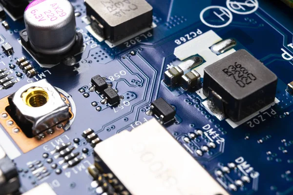 Macro shot of Circuit board with resistors microchips and electronic components. Computer hardware technology. Integrated communication processor. Information engineering. Semiconductor. PCB. Closeup — Stock Photo, Image