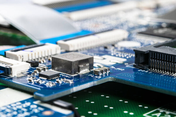 Macro shot of Circuit board with resistors microchips and electronic components. Computer hardware technology. Integrated communication processor. Information engineering. Semiconductor. PCB. Closeup