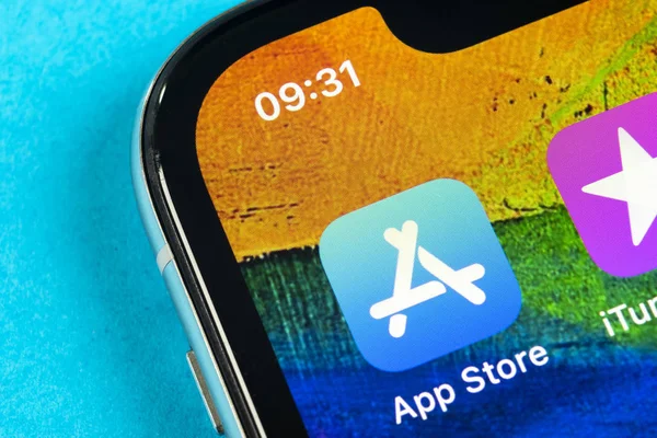 Apple store application icon on Apple iPhone X smartphone screen close-up. Mobile application icon of app store. Social network. AppStore — Stock Photo, Image