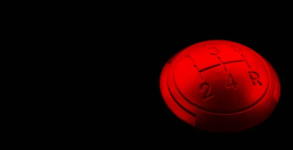 Close up view of a red gear lever shift isolated on black background. Manual gearbox. Car interior details. Car transmission. Soft lighting. Abstract view. Car detailing — Stock Photo, Image