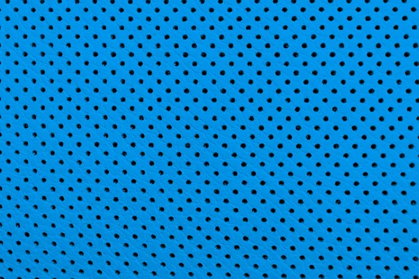 Moderno coche de lujo interior de cuero azul. Parte de los detalles de asiento de coche de cuero perforado. Fondo de textura de cuero perforado azul. Textura, cuero artificial con costuras. Cómodos asientos de cuero perforado — Foto de Stock