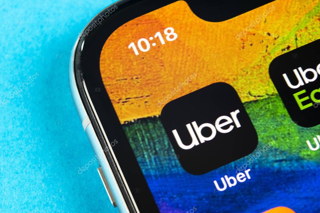 Helsinki, Finland, May 4, 2019: Uber application icon on Apple iPhone X screen close-up. Uber app icon. Uber is taxi car transportation