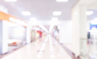 Soyut bulanıklık alışveriş merkezi koridoru. Mağazada bulanık perakende ve salon iç. Defocused bokeh etkisi arka plan veya iş kavramı için fon. Bokeh ışık