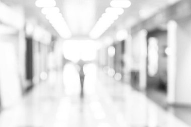 Soyut bulanıklık alışveriş merkezi koridoru. Mağazada bulanık perakende ve salon iç. Defocused bokeh etkisi arka plan veya iş kavramı için fon. Bokeh ışık