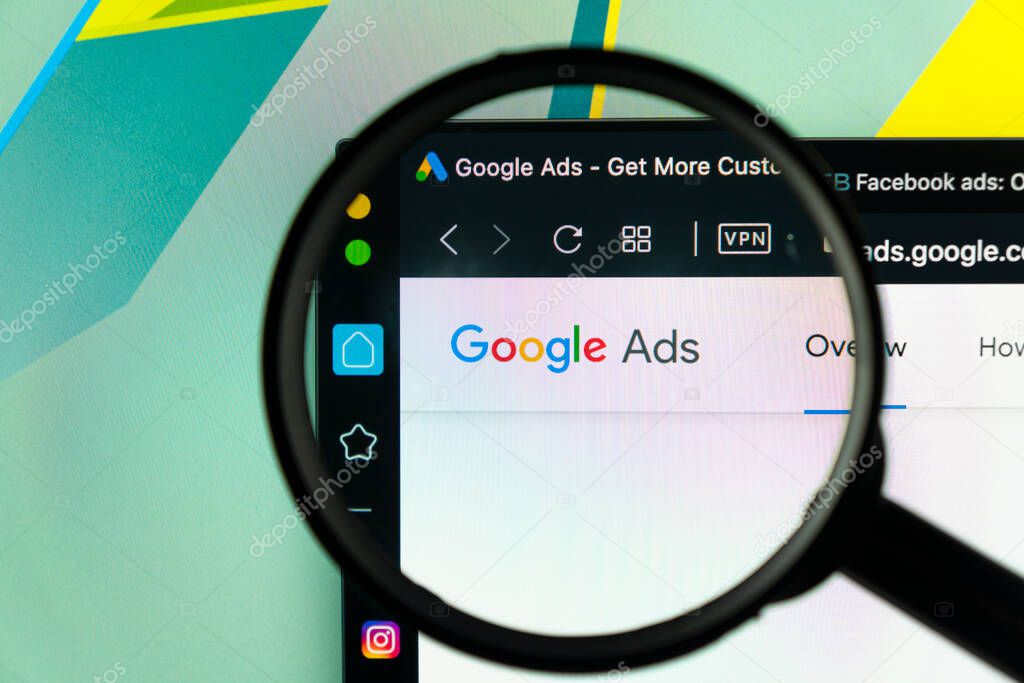Sankt-Petersburg, Russia, June 16, 2020: Google Ads AdWords application icon on Apple iMac monitor screen under magnifying glass. Google Ad Words icon. Google ads Adwords application.