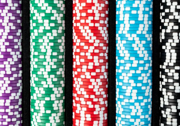 Stack of poker chips isolated background. Poker game concept. Playing a game with dice. Casino Concept for business risk chance good luck. Chips for poker game