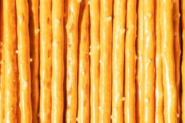 Bâtonnets Salés Ligne Arrière Plan Rangée Vue Dessus Snack Texture — Photo