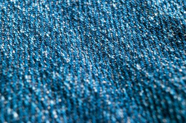 Makro, kot pantolonun kumaş dokusunu çekmiş. Denim kot kumaşı. Kotların yakın dokusu ve şablonu