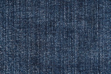 Mavi kot kumaş kumaş arka plan. Denim kot kumaşı. Kotların yakın dokusu ve şablonu