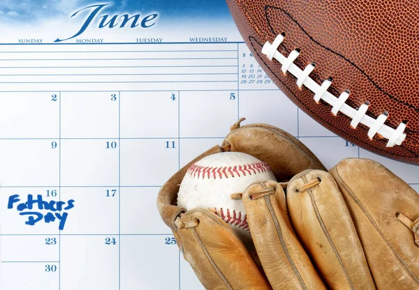 Fathers Day holiday marked on calendar with sports equipment