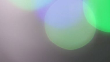 Soyut bulanık ışıklar film, parlayan parçacıklar. Bokeh etkisi. Tv için arka planı göster intro, açacağı, Noel Tema, tatil partisi, blog tanıtımı, olay müzik klipleri, film reklam.