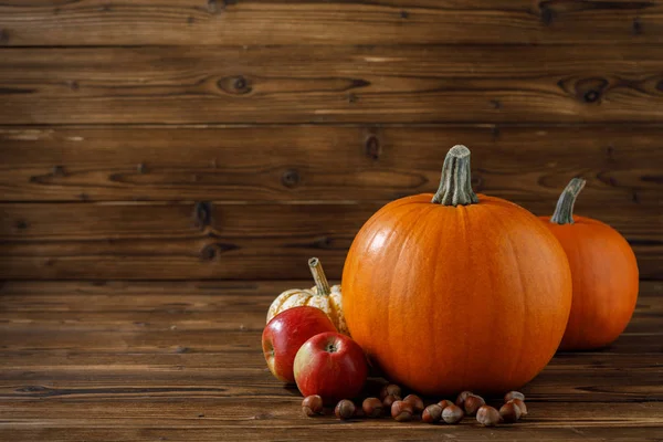 Autumn Harvest Still Life Pumpkins Apples Hazelnuts Wooden Background — Stock Photo, Image