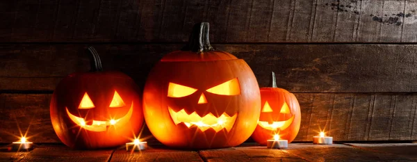 Halloween Zucche Testa Jack Lanterna Candele Sfondo Legno — Foto Stock