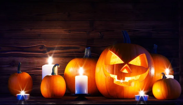 Cabeza Calabaza Halloween Jack Linterna Velas Sobre Fondo Madera — Foto de Stock