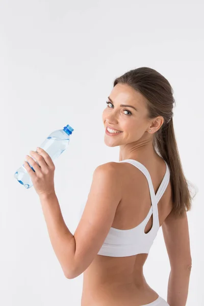 Hermosa Mujer Lencería Deportiva Blanca Con Botella Agua Sobre Blanco —  Fotos de Stock