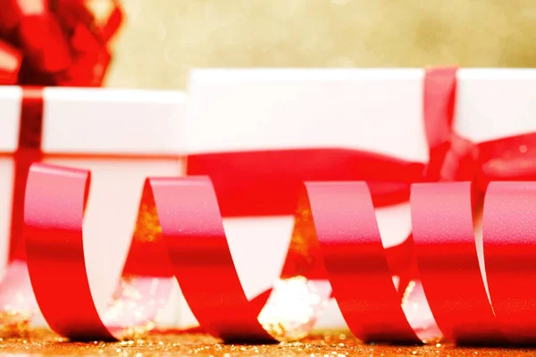 White Gift Box Red Ribbon Bow Golden Glitter Background — Stock Photo, Image