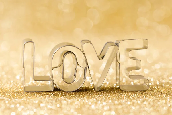 Word Kärlek Gyllene Ljusa Glitter Ljus Bokeh Bakgrund — Stockfoto