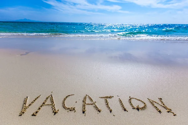 Escritura de vacaciones en una playa —  Fotos de Stock