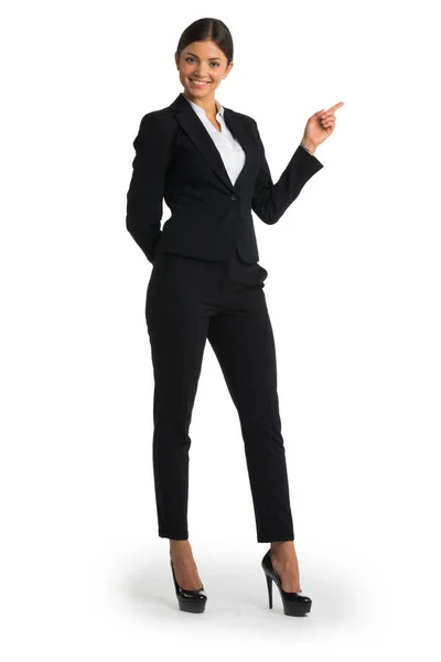 Businesswoman pointing with finger — Stock Photo, Image