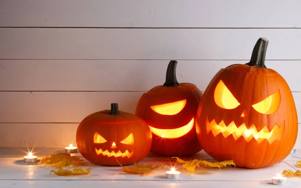 Halloween pumpkin and candles — Stock Photo, Image