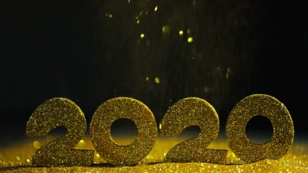 Щасливий Новорічний Фон 2020 Року Падаючі Блискітки Конфетті Чорному Тлі — стокове відео