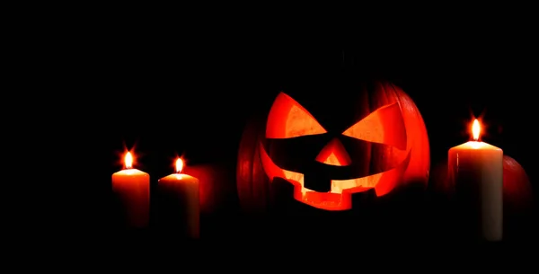 Abóbora halloween e velas — Fotografia de Stock