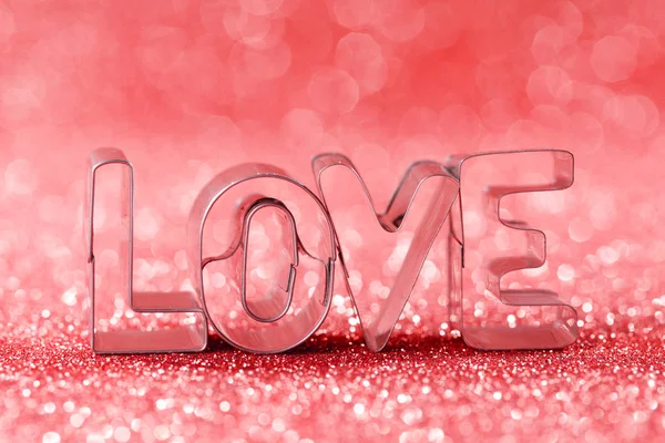 Parola amore su sfondo glitter — Foto Stock