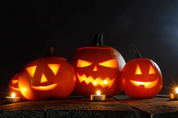 Many Halloween Pumpkins Head Jack Lantern Candles Wooden Table Background — Stock Photo, Image