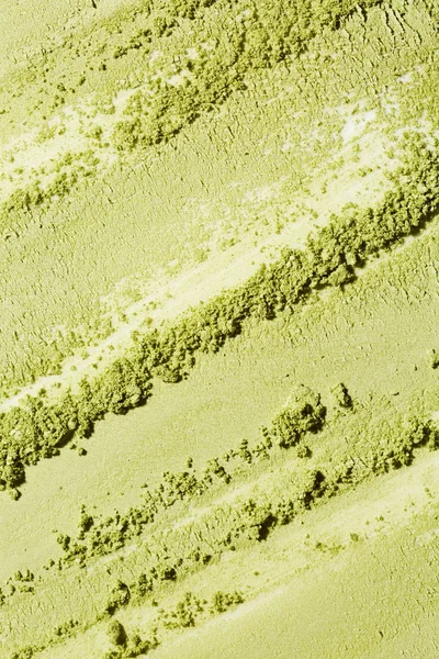 Green eye shadow texture as background
